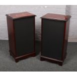 A pair of mahogany speaker cabinets.