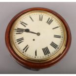 A Victorian 8 day school clock with brass bezel and painted dial, 39cm wide. Sold with pendulum