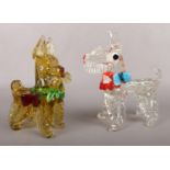 A 1950s-60s Murano amber glass model of a dog with green collar and red bow, along with another
