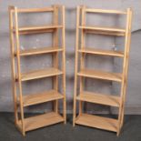 A pair of beech folding shelves, 147cm x 58cm.