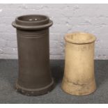 Two terracotta chimney pots.