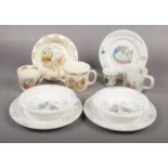 Royal Doulton 'Bunnykins' Three piece child's set, Wedgwood 'Peter Rabbit' plate, cup & egg cup,