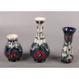 Three contemporary Moorcroft vases, tublined with Charles Rennie Mackintosh design, tallest vase