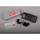 A boxed pair of ladies Ray Ban sunglasses, with case.