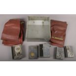 Banking security, a collection of vintage security time recorders, associated cash bags and cash