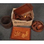 A box of wooden wares including a marquetry tray depicting fighting cockerels, a coopered planter