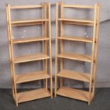 A pair of beech folding shelves, 147cm x 58cm.