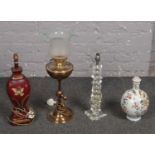 Three table lamps, glass, wooden examples to include ceramic vase base