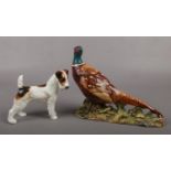 A Beswick model of a pheasant on naturalistic base model 1225 and a Royal Doulton fox terrier HN943.