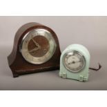 A vintage Ferranti electric clock, along with an oak cased mantle clock.