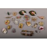 A collection of vintage costume jewellery, mainly brooches including shoe, handbag and butterfly