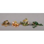 Four novelty yellow metal trinket boxes, each formed as a frog. Enamelled and set with white paste