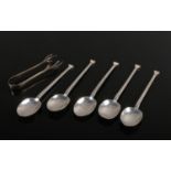 Five Art Deco silver coffee spoons assayed Sheffield 1927 and a pair of silver sugar tongues assayed