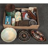 A box of miscellaneous to include cased flatware, vintage tin, ceramics, etc.