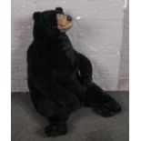 A large stuffed bear teddy. Approximately 95cm high.