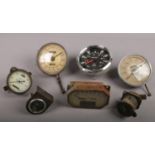 A collection of vintage car speedometers and other gauges including Jaeger and Ripaults.