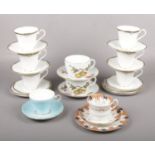 A Royal Doulton Rhodes tea set, cups, saucers, tea plates to include Royal Worcester 'Evesham',