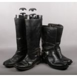 Two pairs of leather motorcycle boots, one by Nevada.