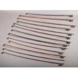 A quantity of violin bows to include P&H London example etc.