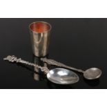A Russian silver beaker with gilt interior and inscribed initials. Along with a Russian spoon with