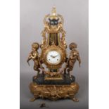 A French style gilt cast metal lyre mantel clock, the convex enamelled two train movement