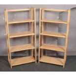 A pair of beech folding shelves, 123cm x 58cm.