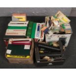 Four boxes of lawnmower and trimmer manuals and parts, to include Flymo, Qualcast etc.