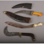 Two kurki knifes to include bone handle example along with a similar folding knife stamped Whitby.