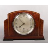 An Art Deco mahogany cased 8 day Westminster mantel clock having strike / silent function. With