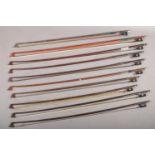 A quantity of violin bows.