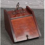 An Edwardian Walnut Coal Scuttle with shovel