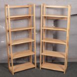 A pair of beech folding shelves, 147cm x 58cm.