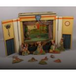 A 1950s Alice in Wonderland wooden Puppet Theatre, Juvenile Productions Ltd No 3803 back drop with