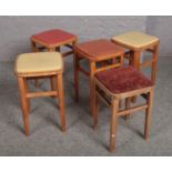 Five vintage wooden stools.