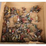 A box of approximately 50 Franklin Mint diecast metal soldiers.
