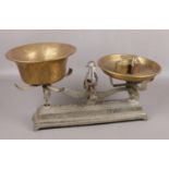 Vintage brass balance scales with weights