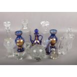 A collection of glassware, to include decanters, controlled bubble vase, paperweights etc.