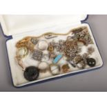 A jewellery box of vintage costume jewellery to include rings, earrings, necklaces etc.