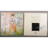 Two autographed LP records; Cilla Black and Diana Ross.