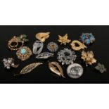 A collection of vintage costume jewellery brooches including gilt metal, turquoise effect and a