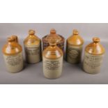 Six stoneware flagons, all Sheffield advertising examples, to include Meadowcroft, Ward, John