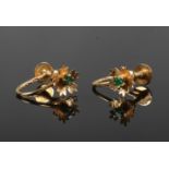 A pair of 9ct gold and emerald screw back earrings.