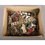 A collection of vintage lead farmyard figures, to include Britains, animals, gates, tree etc.