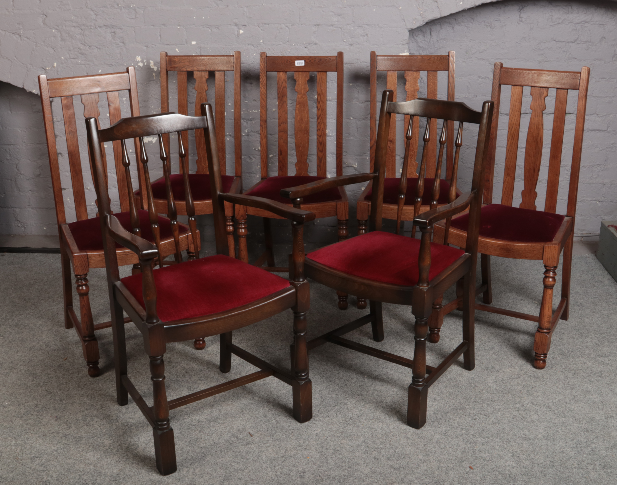 A set of five oak dining chairs, along with two Priory carver dining chairs.