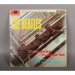 The Beatles Please Please Me LP record autographed by Paul McCartney.