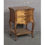 A French style giltwood two drawer bedside cabinet with caneware under tier, 40cm x 50cm, 71cm high.