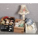 Three boxes of miscellaneous to include onyx table lamp, blue and white ceramics, character jugs,