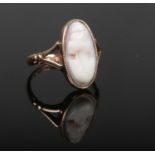 A rose gold cameo ring with split shoulders and millegrain border. Assayed Birmingham 1942, size O.