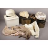 A collection of vintage fur. Including four hats and three stoles.