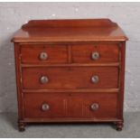 A Victorian mahogany two over two chest of drawers with moulded glass drawer pulls, 100cm x 48cm,